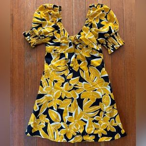 Yellow and black summer dress. Tie front, defined waist, a line skirt
